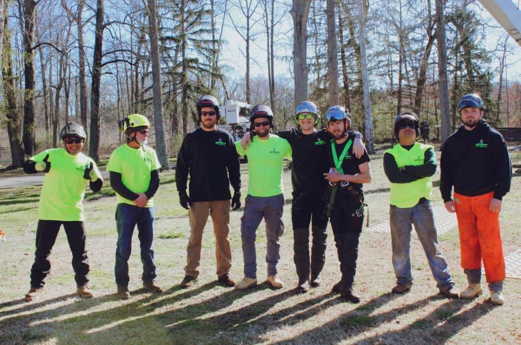 Garrison's Tree Service crew standing together on a job site